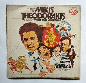 The Music Of Mikis Theodorakis - Played by Manos Tacticos & His Bouzoukis " Including Theme From ' Z ' Zorba's Dance & Prisoner Of Freedom atribute by Tacticos "