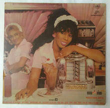 Donna Summer ( She Works Haad For The Money )