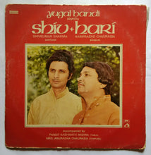 Yugal Bandi Played By Shiv + Hari " Shivkumar Sharma ( Santoor ) Hariprasad Chaurasia ( Bansuri ) " Accompanied By Pandit Kashinath Mishra ( Tabla ) Mrs. Anuradha Chaurasia ( Tanpura )