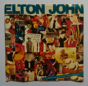 Elton John " Contains a New Song Not Available On The LP, Caasette Or CD " ( EP , 45 RPM )