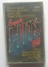 Super Hits '86 " Elton John , Olivla Newton , John.ABC , Dire Straits. Yello , Cameo , Tears For Fears , Rene And Angea , And Others "