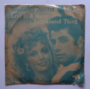 Olivia Newton - John " Hopelessly Devoted To You , Love Is A Many Splendored Thing . " ( EP  , 45 RPM )